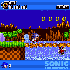 Green Hill Zone. Note the HUD has all moved outside of the screen, into blue bar areas, preventing the game from having to be stretched to meet the unusual dimensions.
