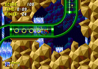 A winding tube brings Sonic to a lower area near the start of the stage, although normally he would be spinning through these.