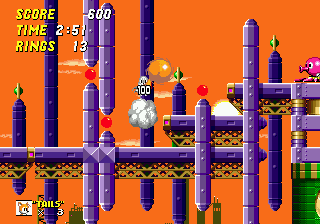 Purple pillars and red and green spherical decorations give this level an unusually abstract slant.