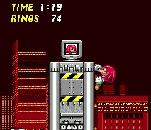 Glide into a wall to clamber onto it, and then climb up or down. This is one of several Knuckles-only extra lives available in the Chemical Plant Zone.