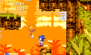 As Sonic or Tails, the Act 1 boss is just above this area, to the right. Using the collapsing ledge on the left from this sturdy boulder might be a small challenge for new players because of the spikes and nearby badnik.