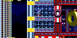 Follow the main route, as high as you can go off of the first checkpoint, to two huge rotating cylinders. The ring is in the wall to the right of the second.