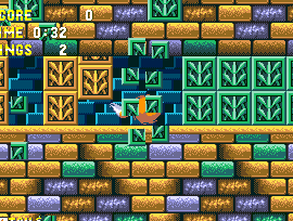 Green barrier blocks can be destroyed with a spin dash. Impenetrable yellow ones may appear in their place when you pass, acting as one-way doors, so you can't go back.