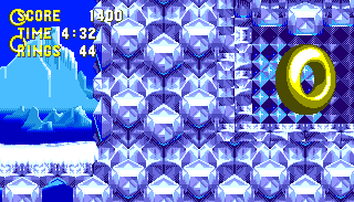 This ring is hidden in the wall of a tall room filled with long columns of (regular) rings which you can grab by use of a trampoline. The only way to get here is to hit the slope after the final checkpoint with a lot of momentum. 