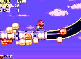 ..Knuckles runs to escape the flames as they engulf the platform..
