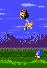 If you fall, Tails will swoop down off-screen to retrieve you. Meanwhile, watch out for Eggman escaping into the background. The direction he goes in will indicate where he then re-ermerges into the frame.