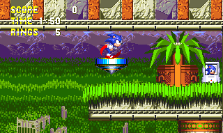 Use the spinning top to navigate around the ledge with a fire shield, and aim toward the top right of this large room. An extra 1-up can also be obtained. 