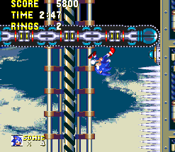 This reverse-gravity conveyor elevator sequence is particularly dangerous. A checkpoint sits just before it, with no rings in between. If you should lose your lives on it, you'll have to go through it again without rings! In order to make avoiding the missiles easier, try and stay to one side, and force the missile launchers on the opposite wall off the screen, preventing them from firing.