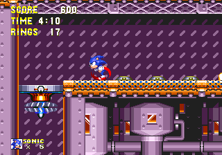 Various mauves, lilacs and purples are central to Flying Battery's colour scheme, found in the various tanks and pipes within the foreground, the framework of thinner walkways, and darkest in patterned walls of some narrow corridors. Most things are tipped with a dash of old-fashioned bronze however, typical of Eggman designs of this era.