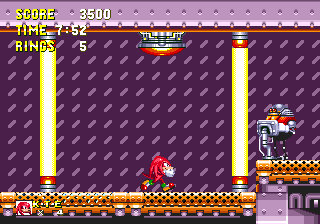 As the blasts continue, the yellow beams on the side, trapping you in, gradually get closer and closer. Eventually though, the whole machine will start to combust by itself, as many of Eggman's traps seem to conveniently do, and the round doctor himself, or his robotic replacement, will leave the control panel on the right and run for his life!