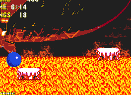 After a merciful checkpoint, you'll come to a lava-fall. As soon as you see the small pink platforms appear and begin to slide down it, carefully jump across them. Again, certain death awaits below if you slip..