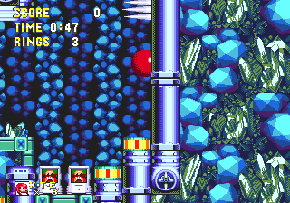 ..As Knuckles, the slightly less clear alternative is to head towards the bottom right of the room, avoiding the two Eggman items. If you attempt to climb the wall here, you'll instead knock through it, finding your separate path therein.