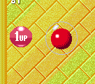 Look for this rarer 1-up gumball, particularly towards the top of the room.