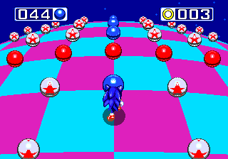 The final Special Stage takes you on a tour of various blue formations. One of the more straightforward is this cross of blues within a field of bumpers. After doing one line, be sure to jump over the central sphere that obviously unites both lines in the cross.