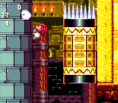 As Knuckles, you can return to the starting point if you like and climb the left hand wall of the initial room. carefully pass these moving blocks in the shaft above and continue up for a hidden Special Stage ring and other goodies on a secret route.
