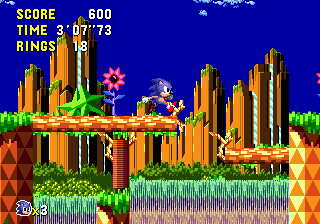 Palmtree Panic features the backdrop of exotic rocky skyscrapers piercing the rich blue sky, waterfalls tumbling and all.