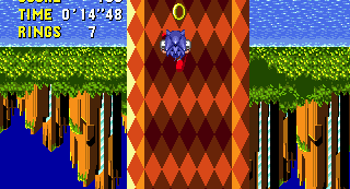 A nice trick, the background turns upside down to suggest that Sonic is now upside down, inside the huge loop.