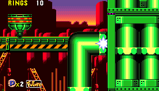 ..The route takes you down through a transport tube. Beware if you're playing the PC/Sonic Gems Collection version of the game, and have a Future post activated. The tube is long enough to teleport you away, which, if you're after the machine, is not what you want!..